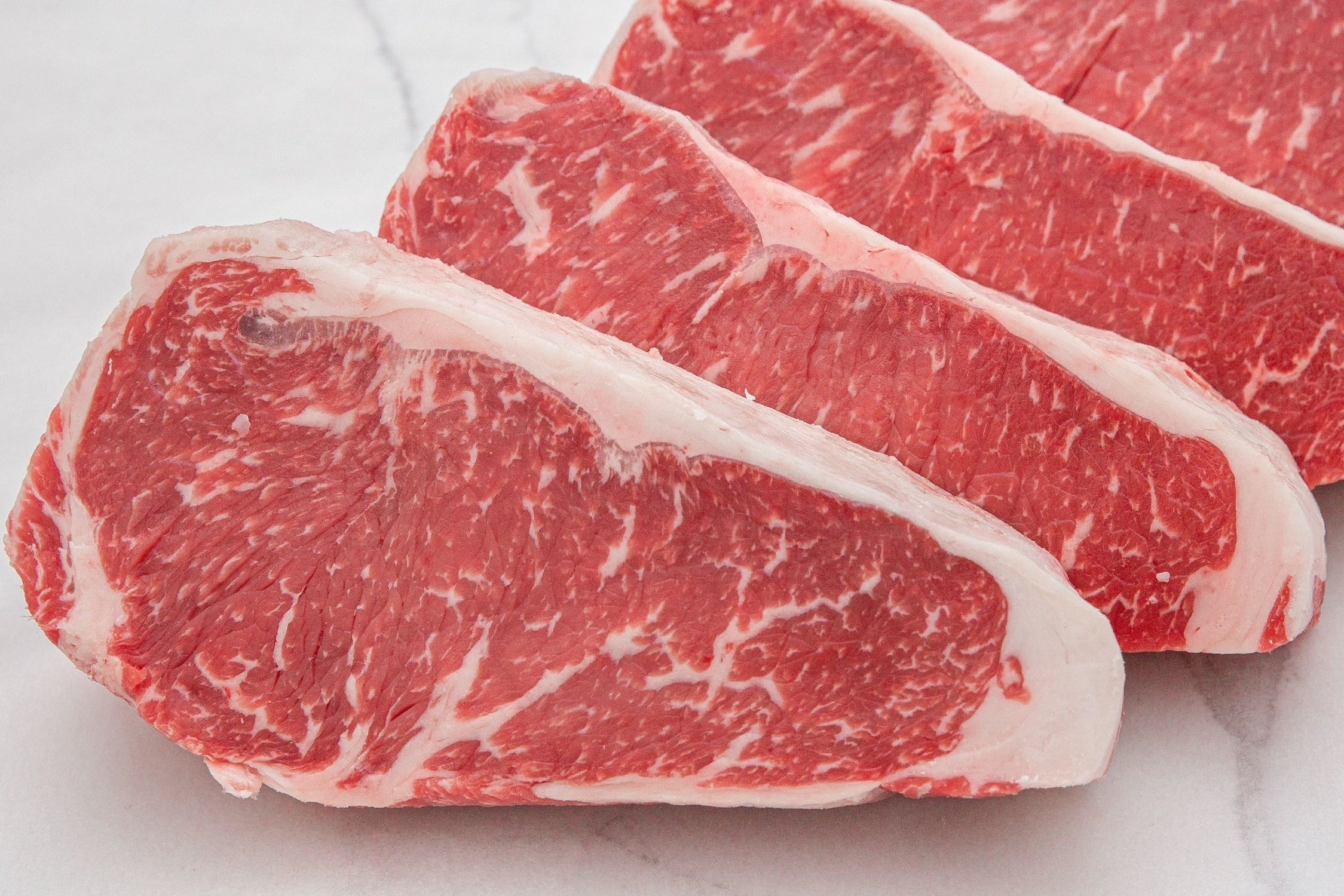 Dry-Aged USDA Prime Black Angus Beef Boneless NY Strip Steak – Pat