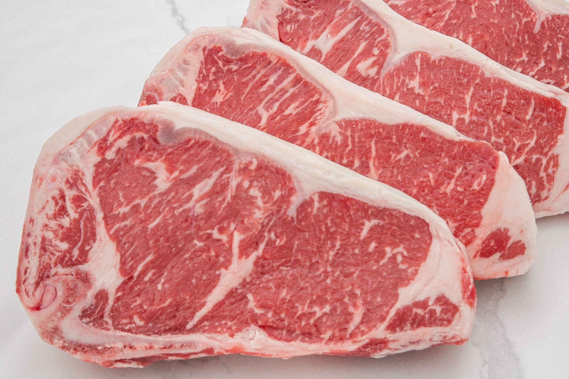 Dry-Aged USDA Prime Black Angus Beef Bone-In NY Strip Steak – Pat